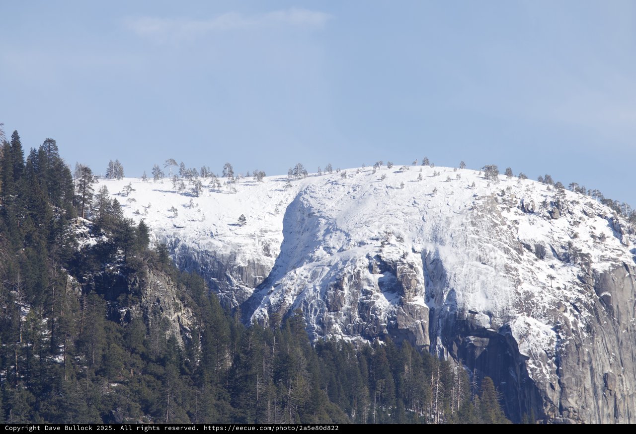 Snow-Covered Granite Dome in Yosemite Valley Winter