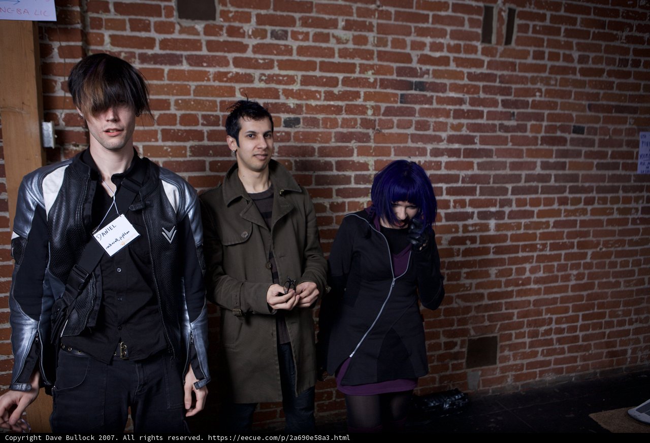 Standing Beside the Brick Wall