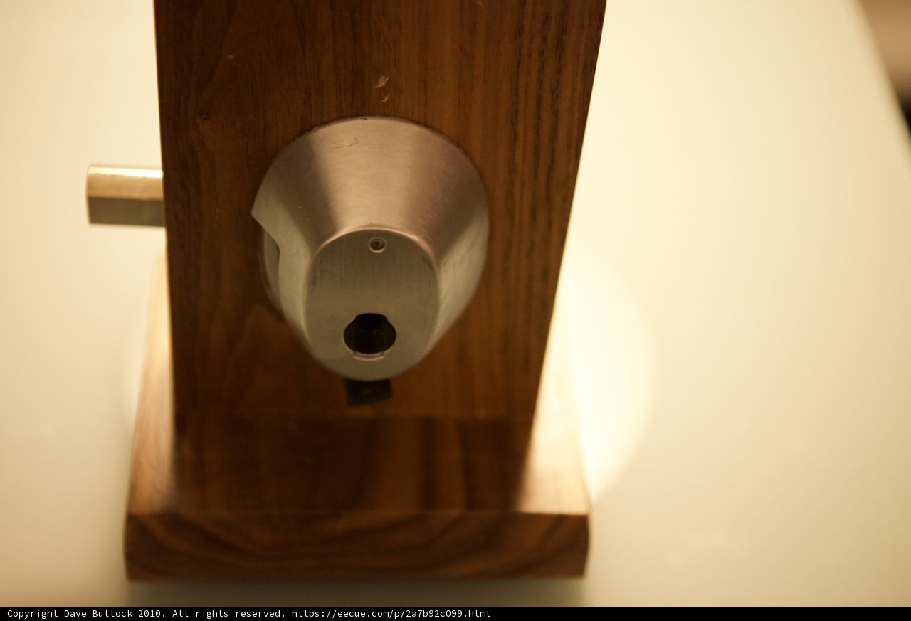 Wooden Stand with Metal Object
