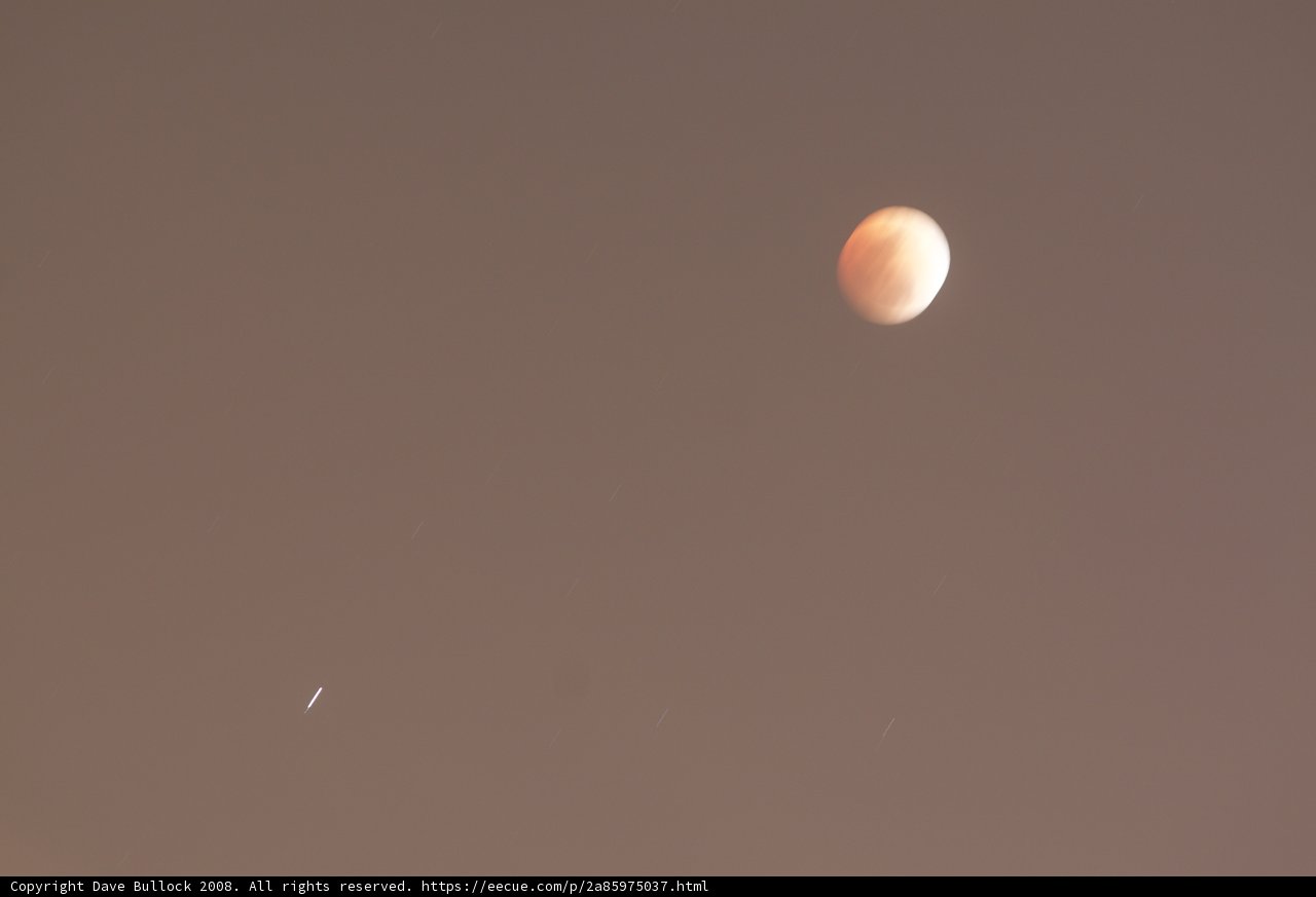 Lunar Eclipse with Mysterious Visitor