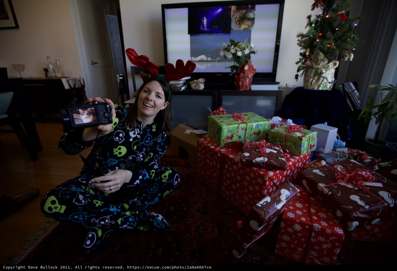 Christmas Morning Selfie with Reindeer Antlers and Presents