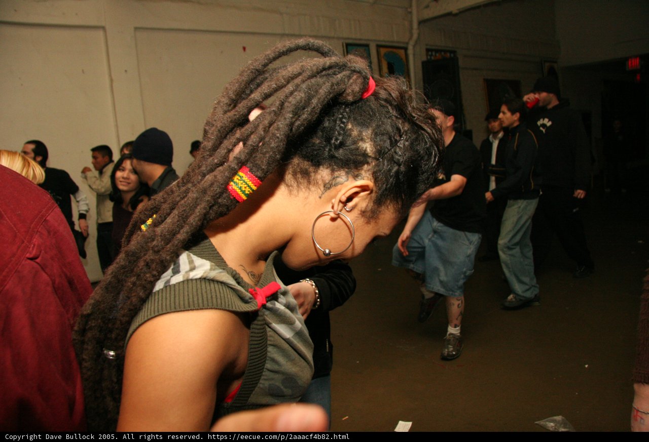 Dreadlocked Woman Rocks Beanie and Jeans