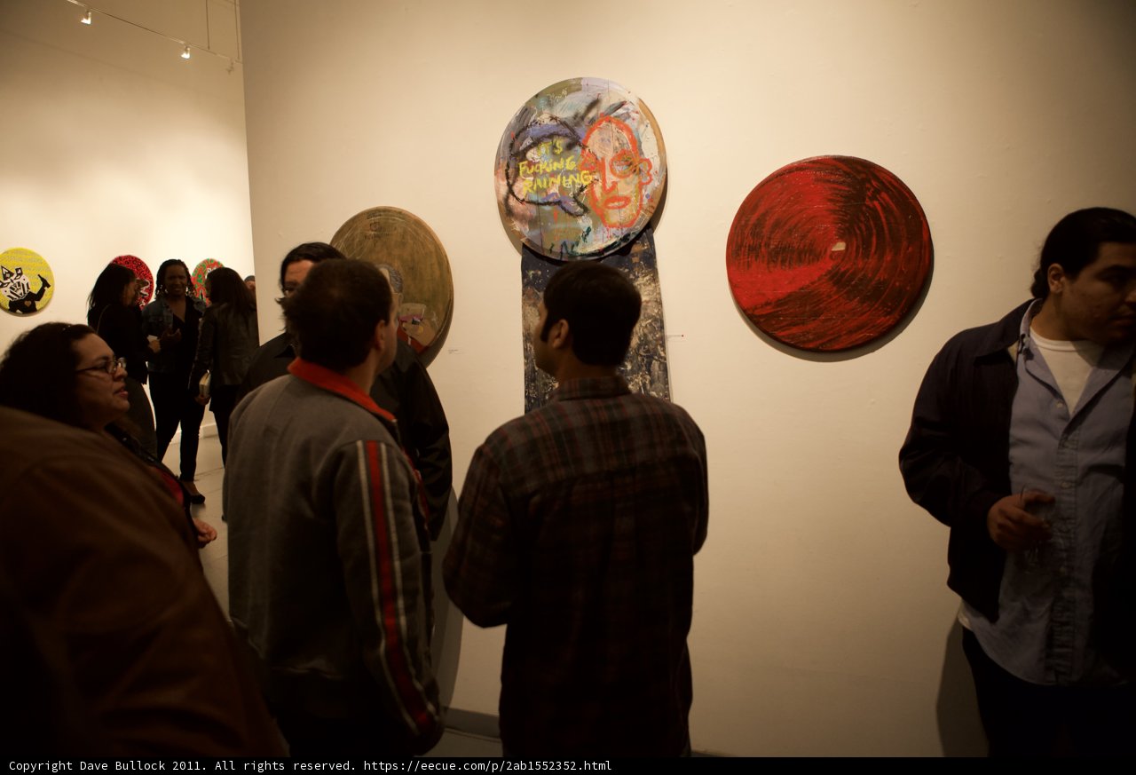 Effie Brown Admires Art at Plata Wine Party