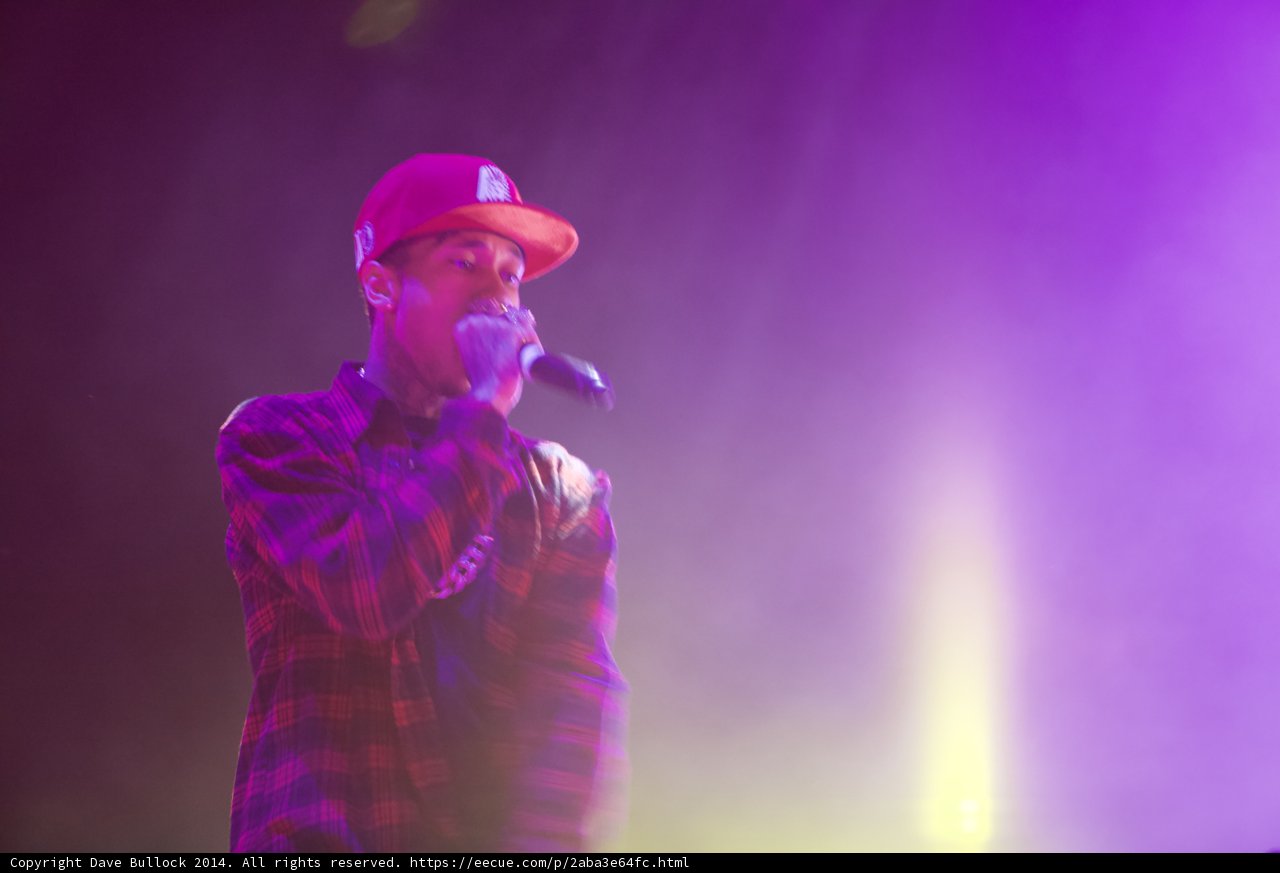 Tyga Rocks the Crowd in a Red Hat