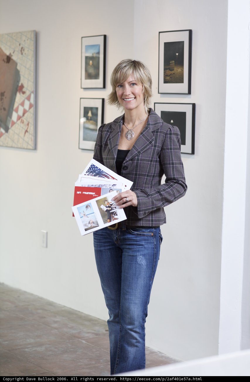 Woman Engrossed in Art Magazine