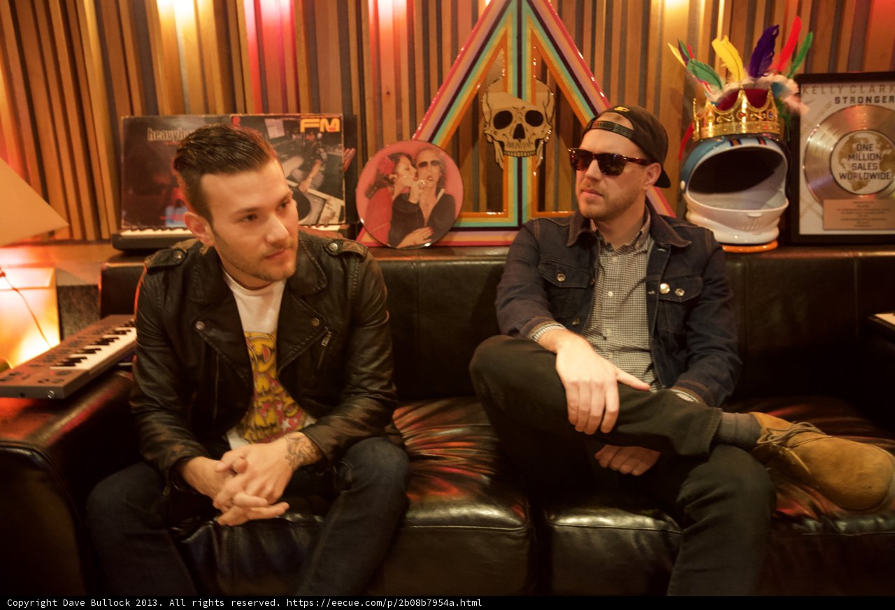 Two Men Relaxing in a Cozy Living Room