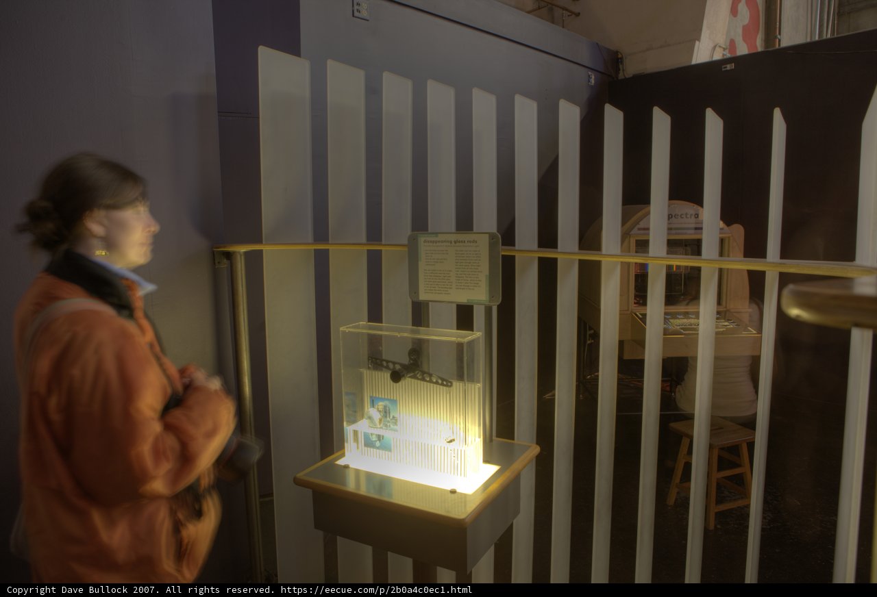 Woman Admiring Plywood Furniture Display Cabinet