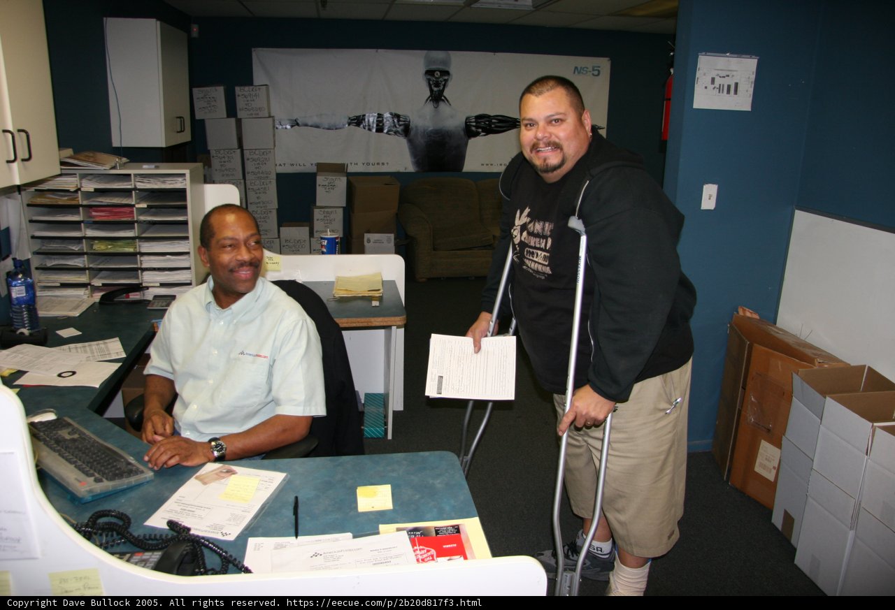 Man with a Crutch at the Office