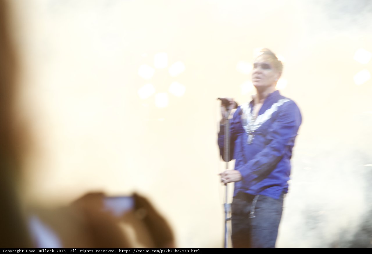 Morrissey Motion Blur Blue Shirt White Stripe Mic Stand Stage Lights Phone Recording