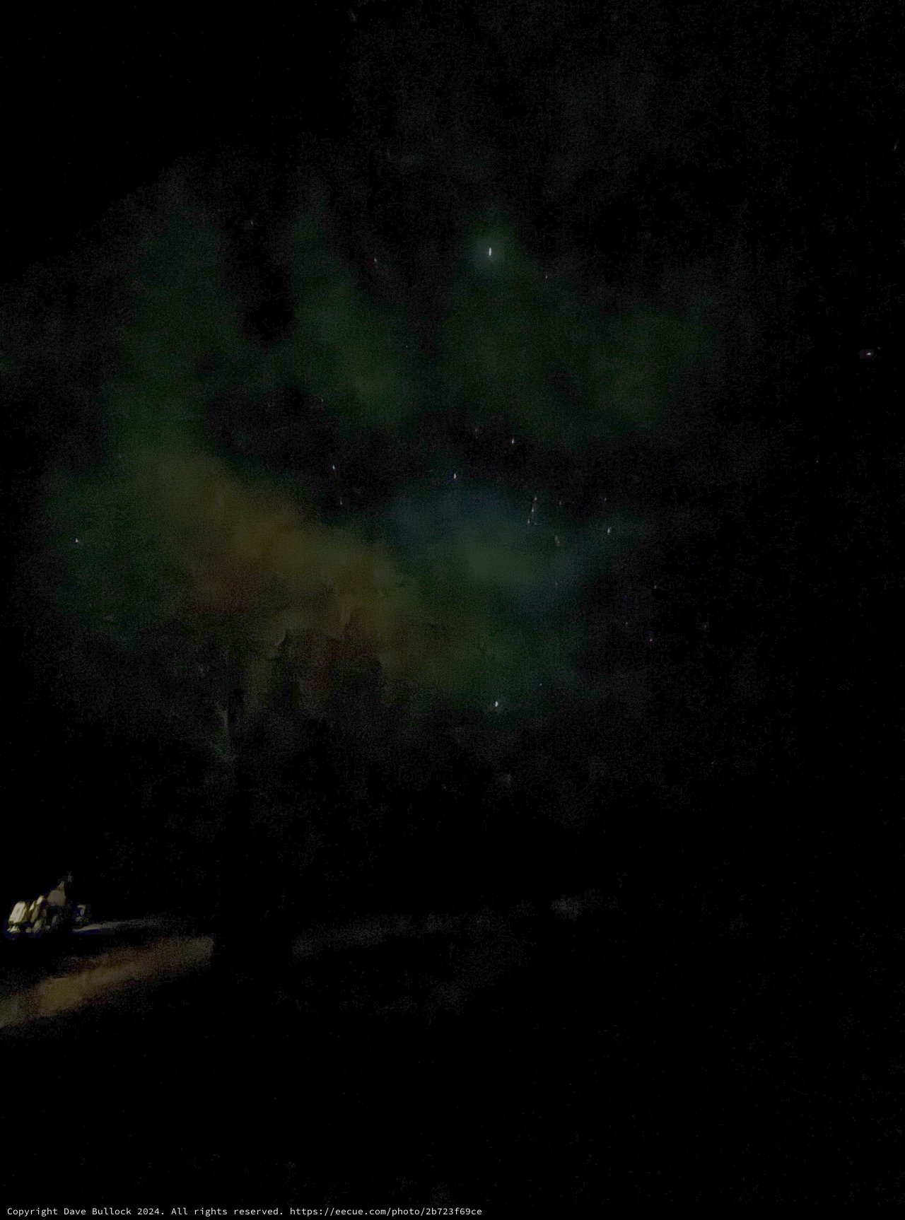 Ethereal Northern Lights Dancing Over Winter Landscape
