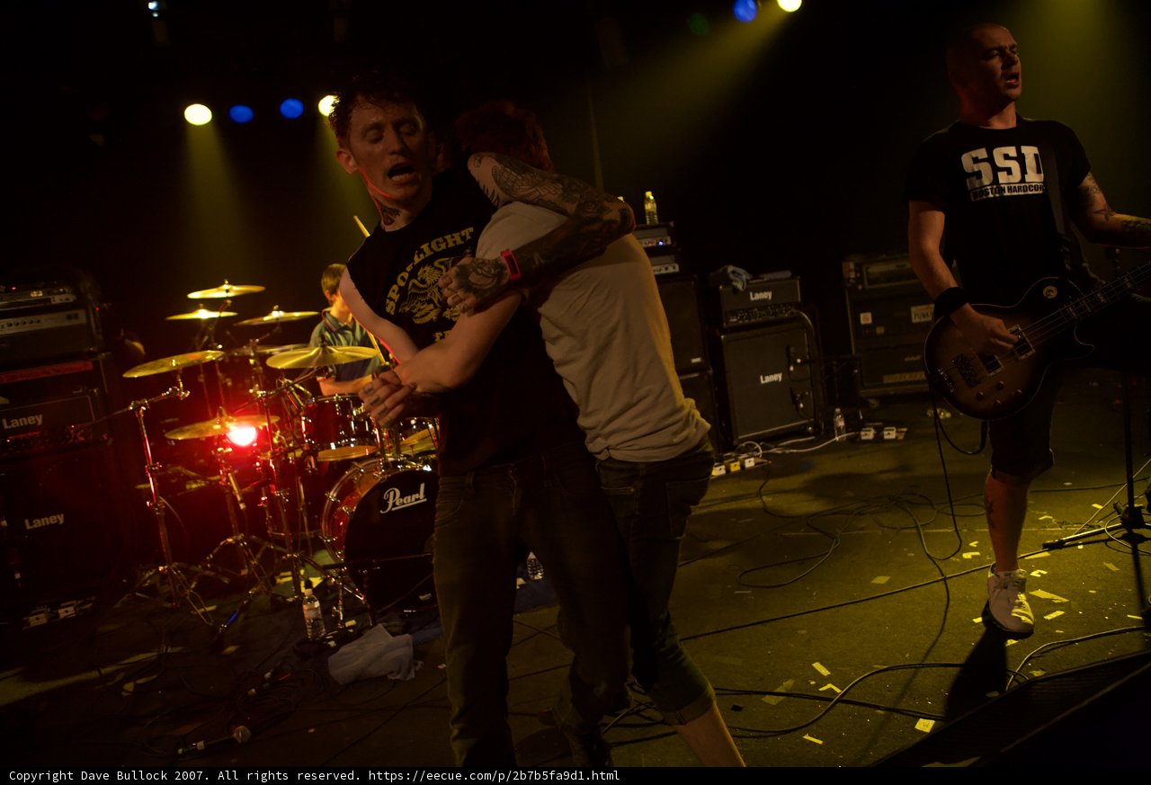 Emotional embrace during Bad Religion performance