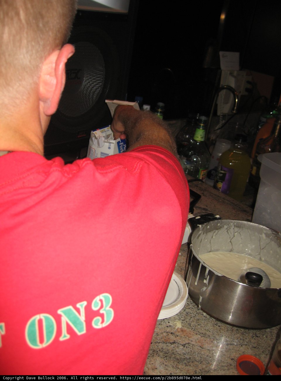 Red Shirted Man Enjoying a Meal