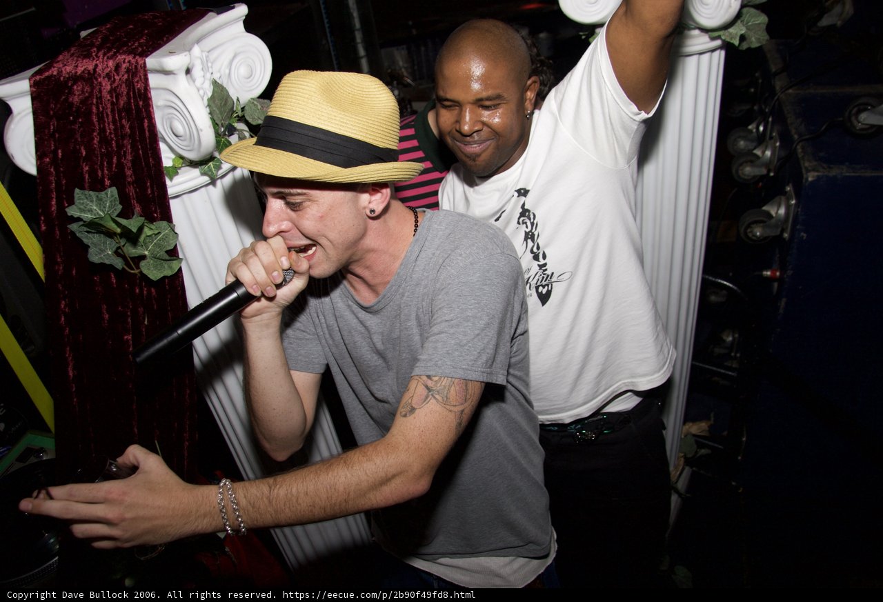 Singing Duo in Fedoras