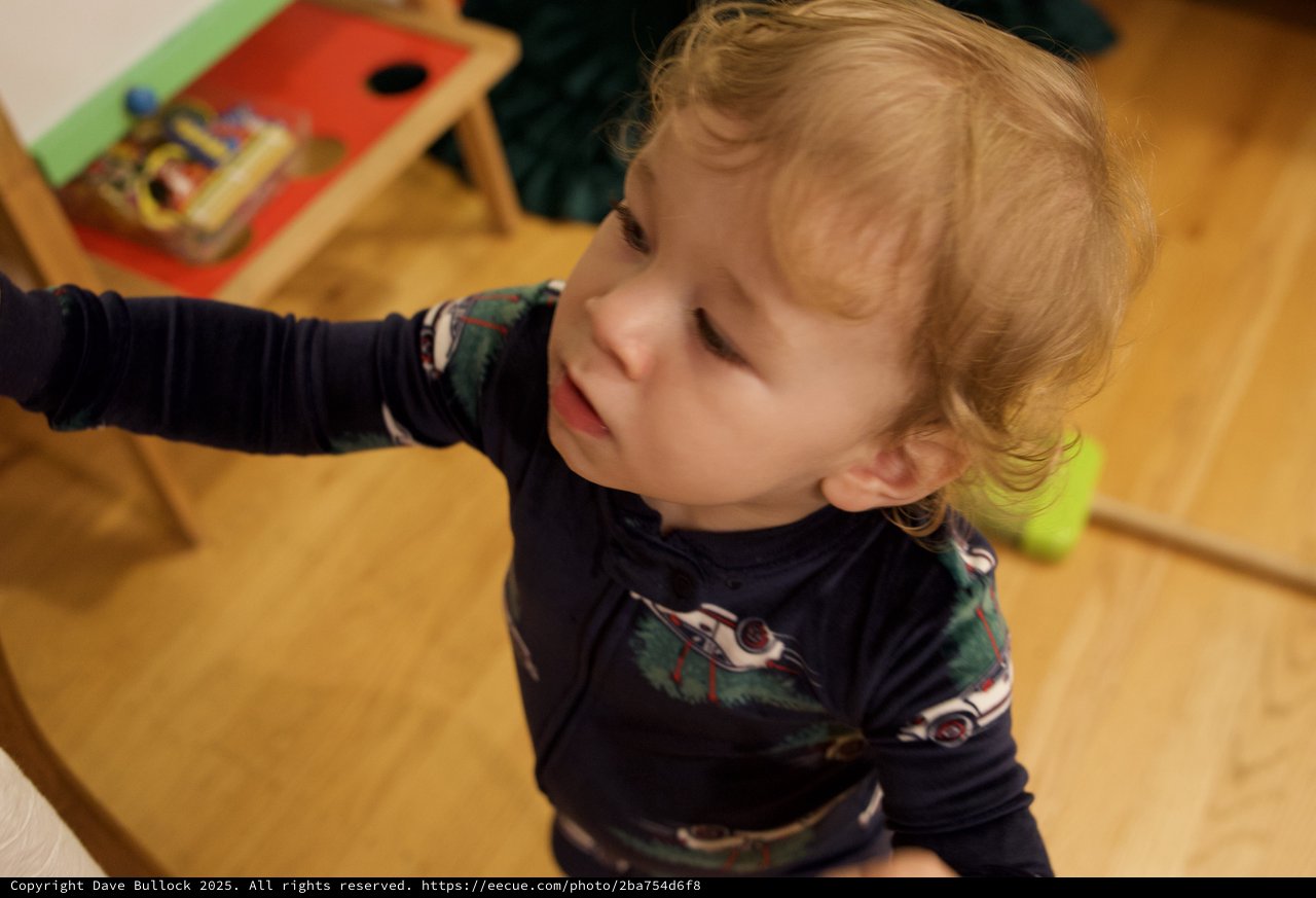 Joyful Toddler on Christmas Morning 2025