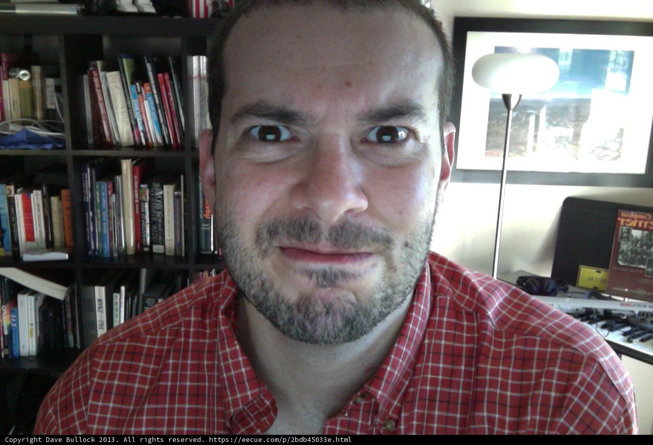Portrait of Dave B among his personal library