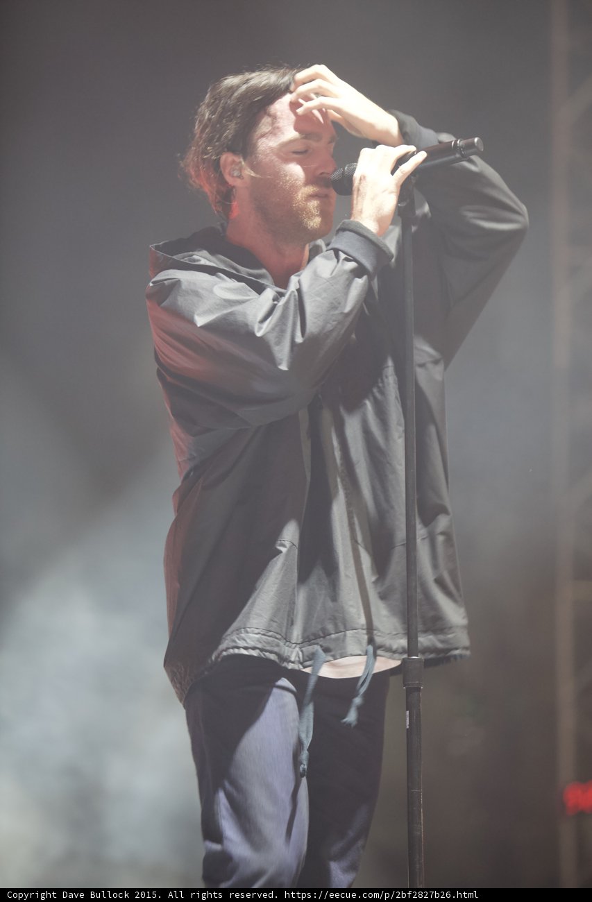 Singer Hand to Forehead