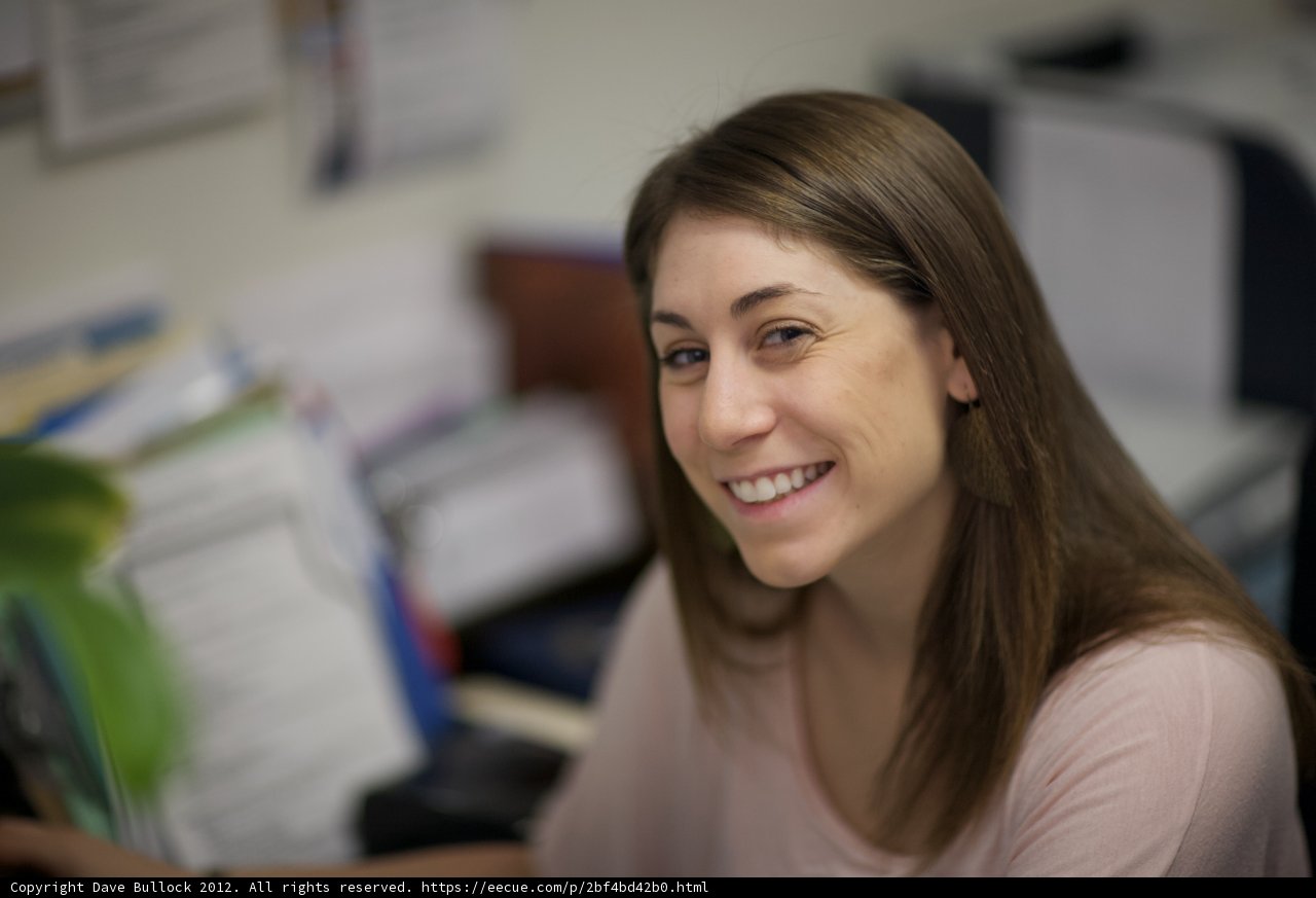 Happy Woman at Her Desk