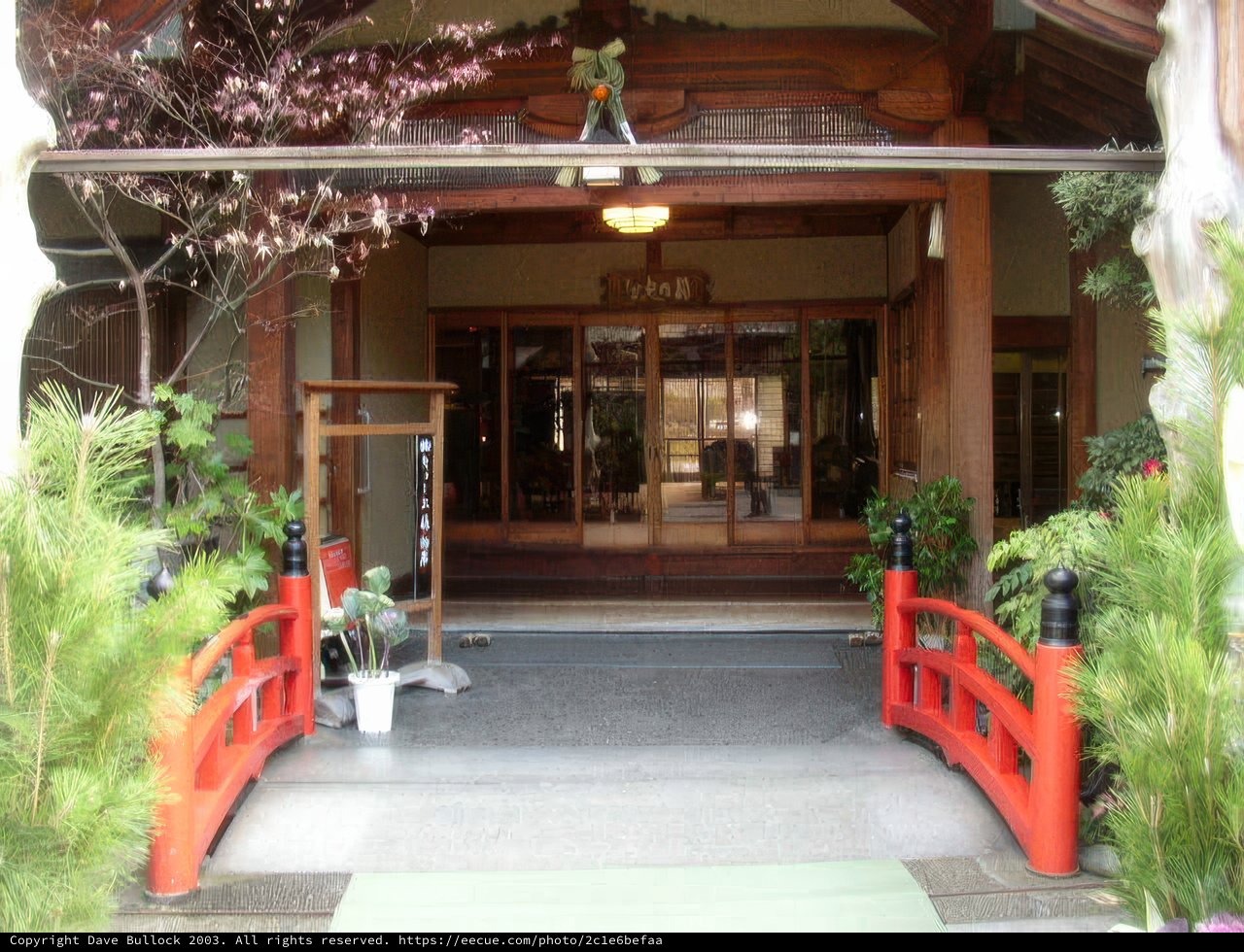The Red Bridge at the Entrance of a Traditional Japanese House