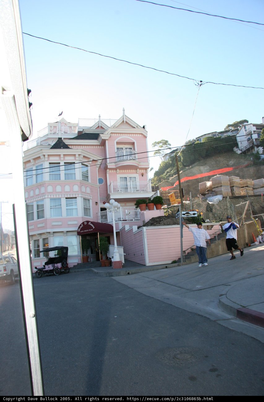 Pink Building with a White Roof