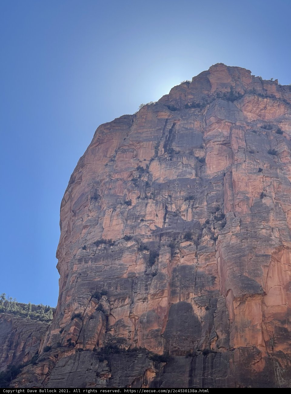 Majestic Cliff Formation Basking in Sunlight