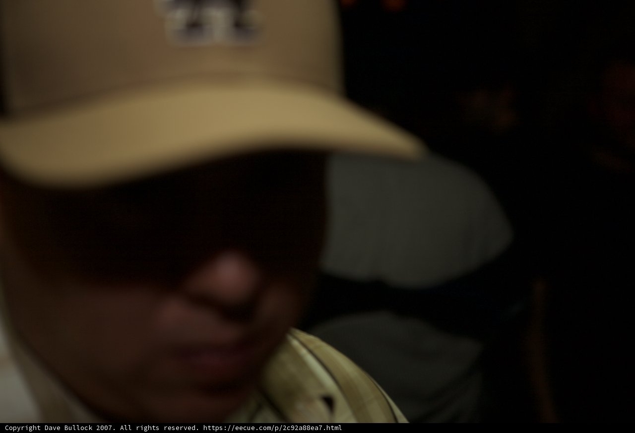 Shadowy Figure in a Hat