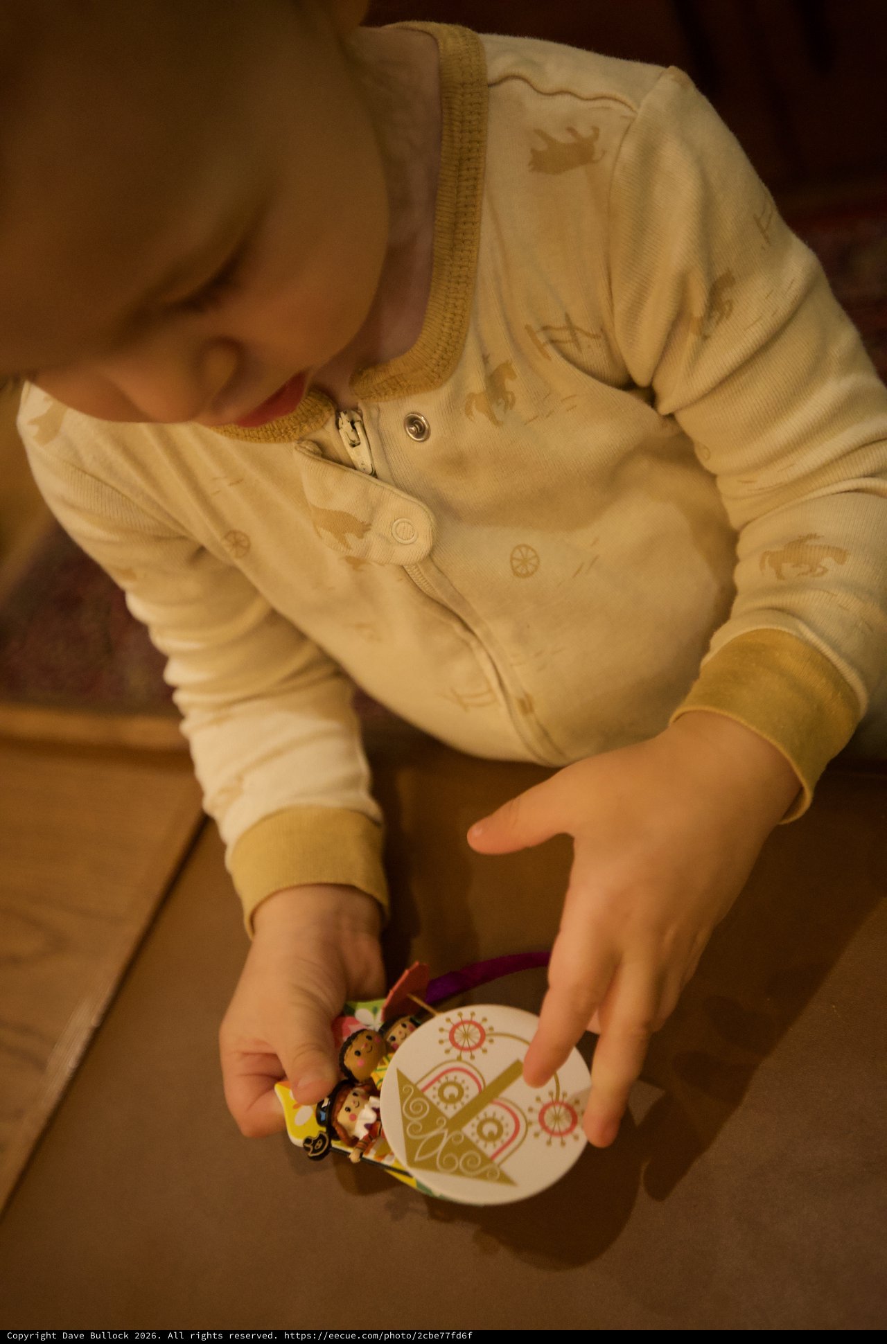 Toddler Decorating Christmas Ornament at Home