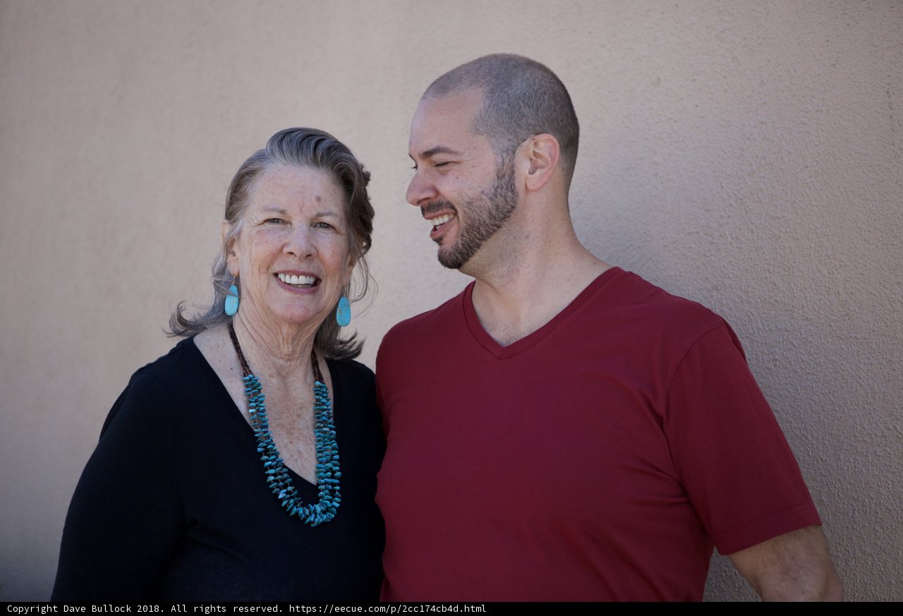 Smiling Couple Adorned in Artisan Jewelry