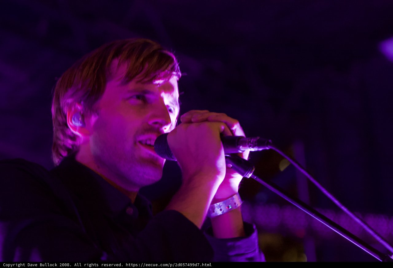 The Man in the Purple Suit Rocks the Stage