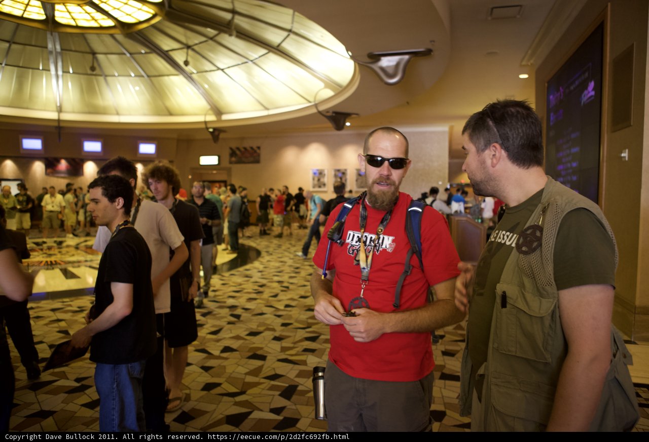 Two Men Admiring the Dome Ceiling in a Lobby