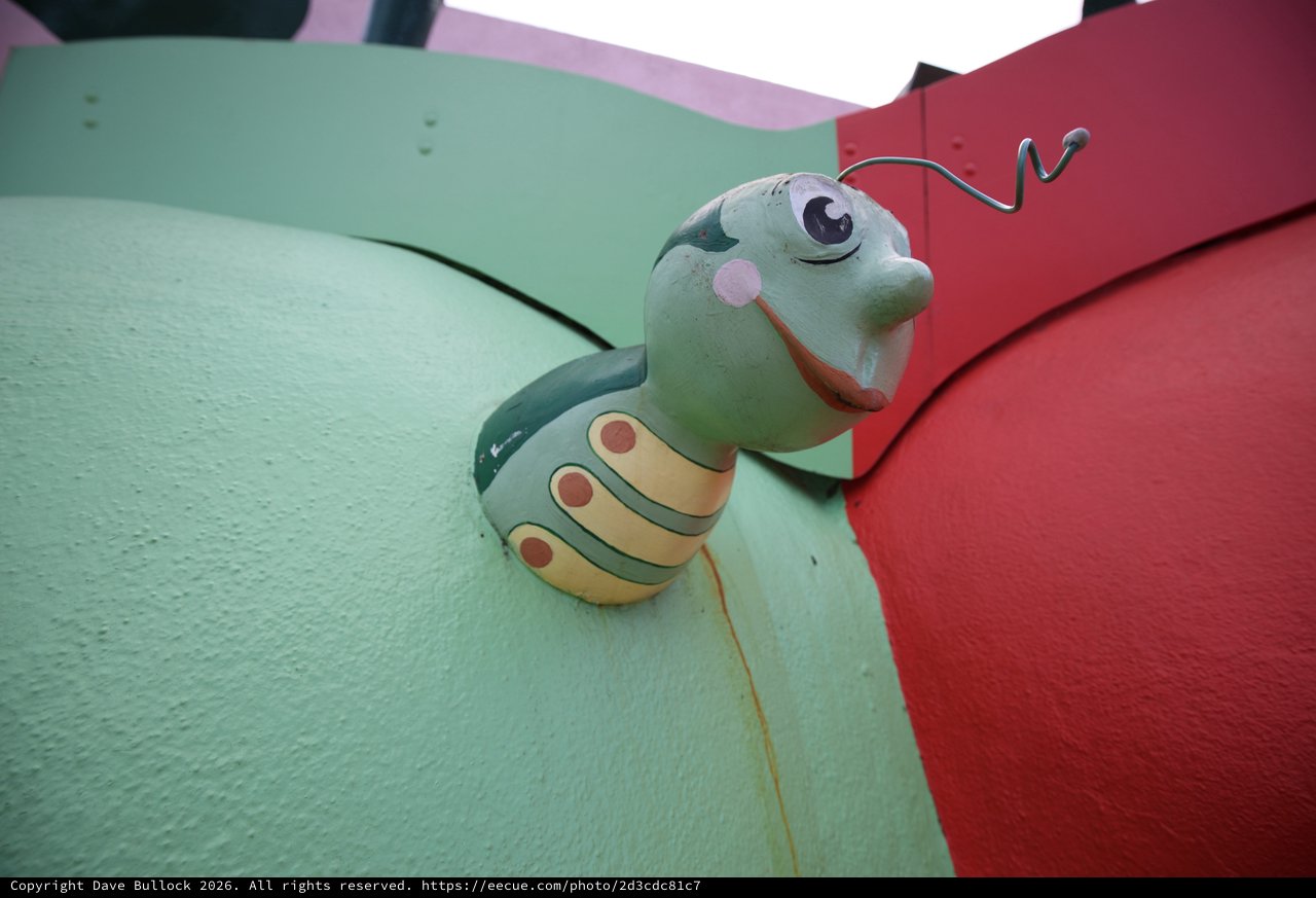 Whimsical Caterpillar Sculpture at Colorful Playground