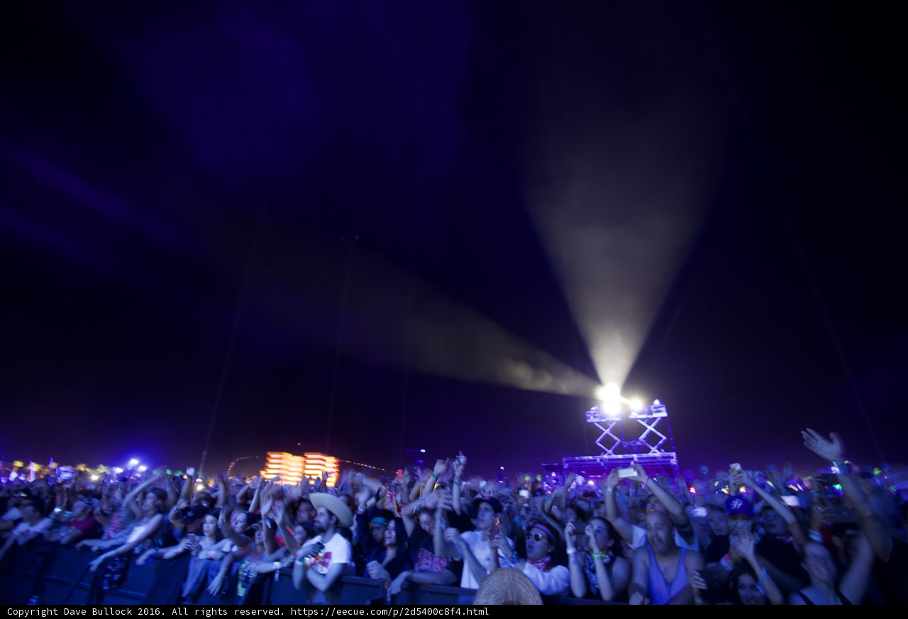 Night Sky Illuminates Thrilled Crowd at Outdoor Concert