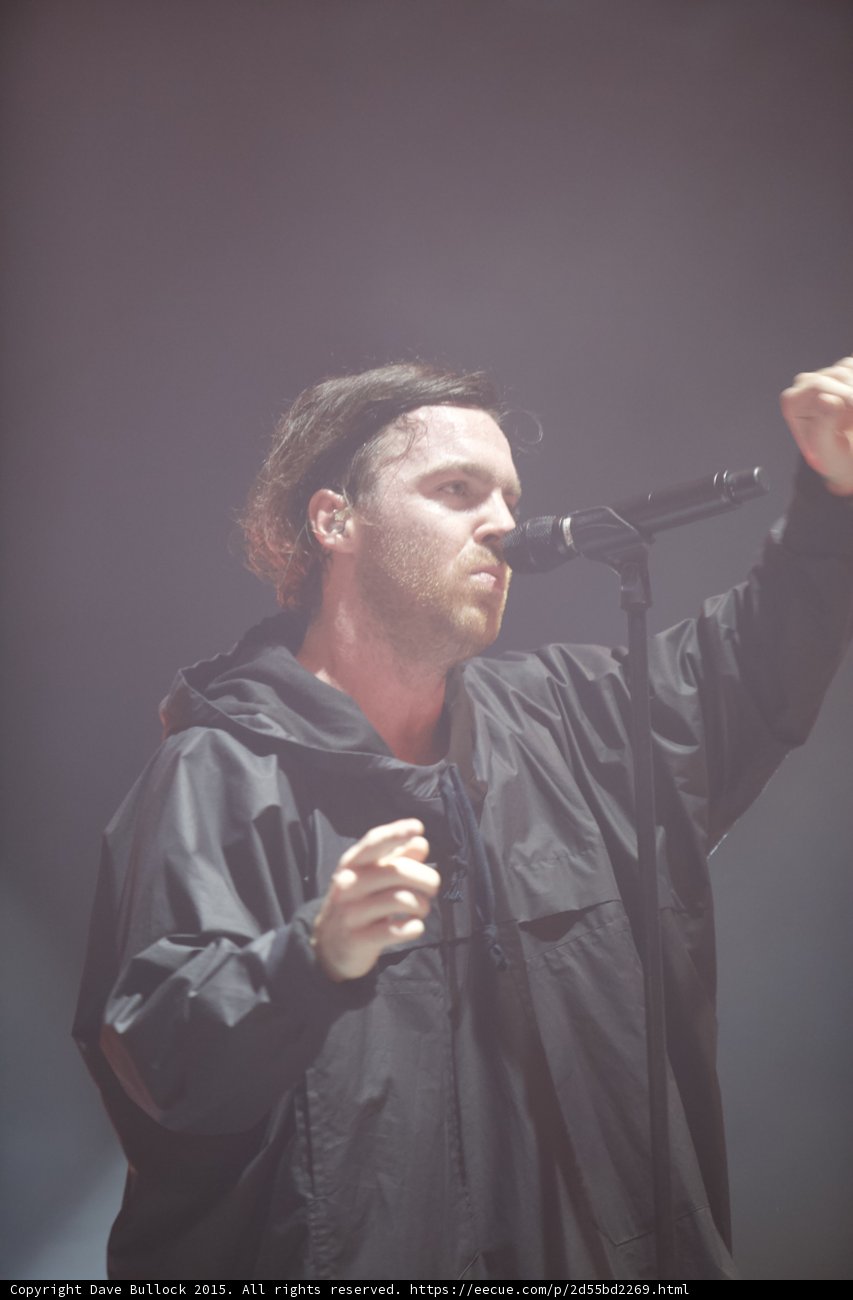 Singer Close Fist at Mic