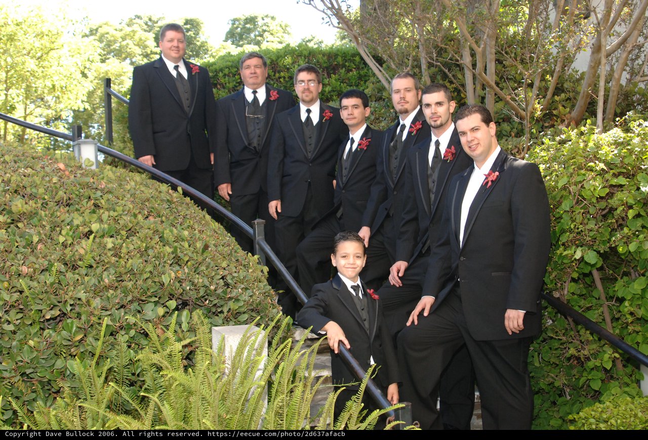 Groomsmen Pose on Outdoor Staircase Before Wedding Ceremony