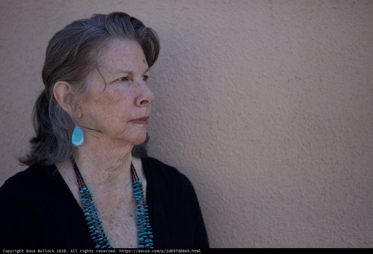 Turquoise Earrings and Black Shirt