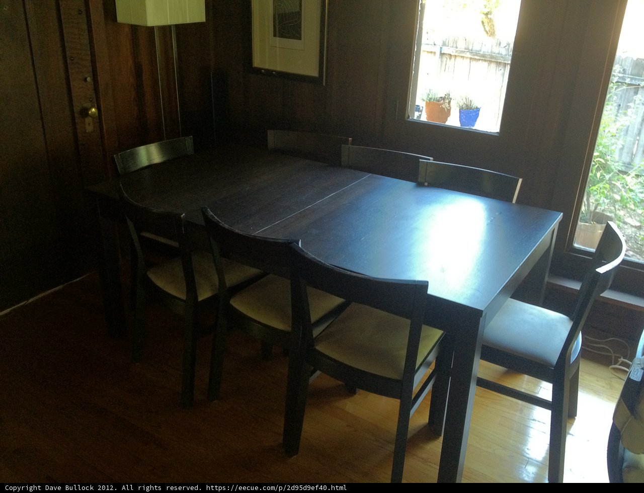 Artistic Interior of a Dining Room Table and Chairs
