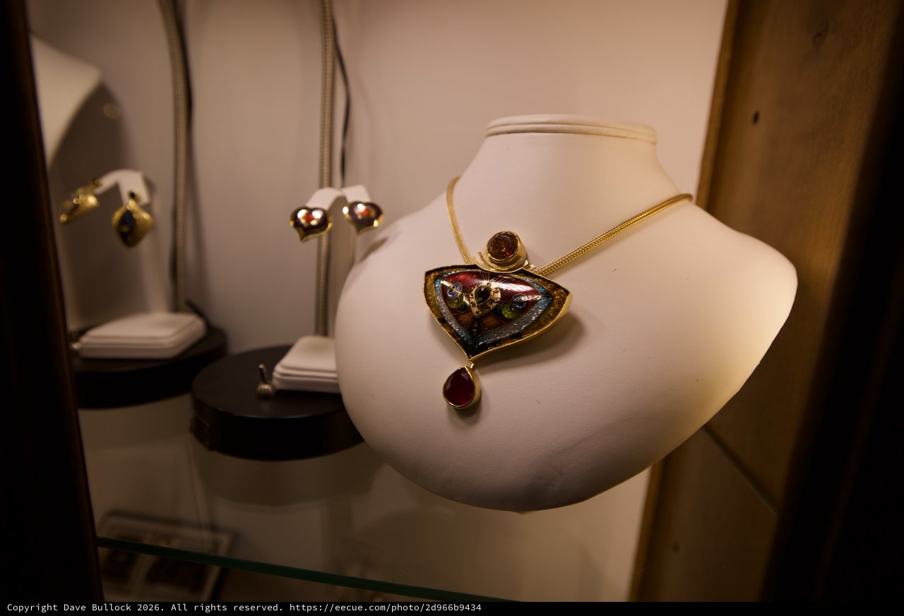 Artisan Jewelry Display with Boulder Opal Pendant Necklace