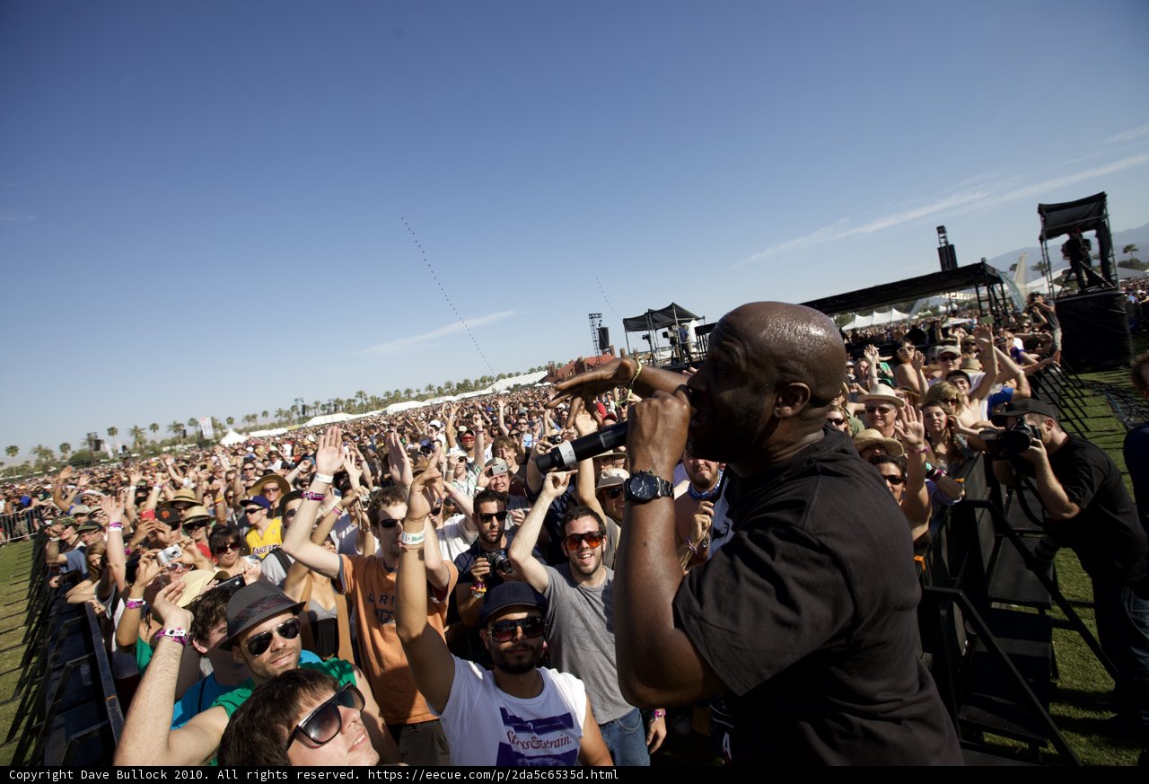 Crowd Goes Wild for Mike-Holding Man