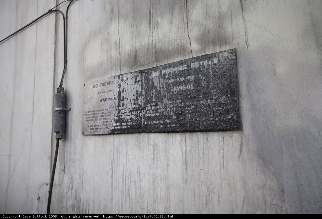 A Plaque on the Architectural Slate Wall with Wires