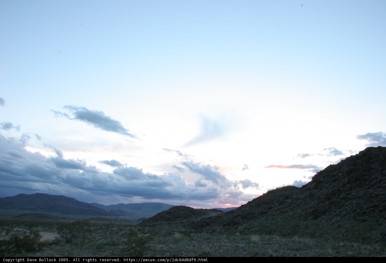 Majestic mountain range under cloudy skies