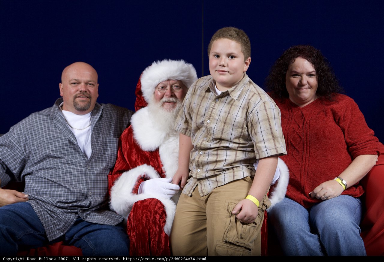 A Festive Family Photo with Santa Claus
