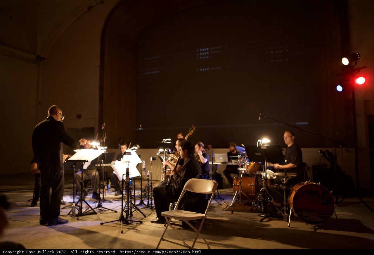 Music Band Performing to a Packed Crowd