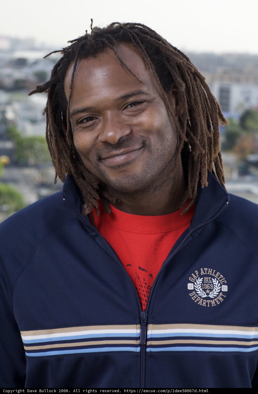 Smiling Man in Layers
