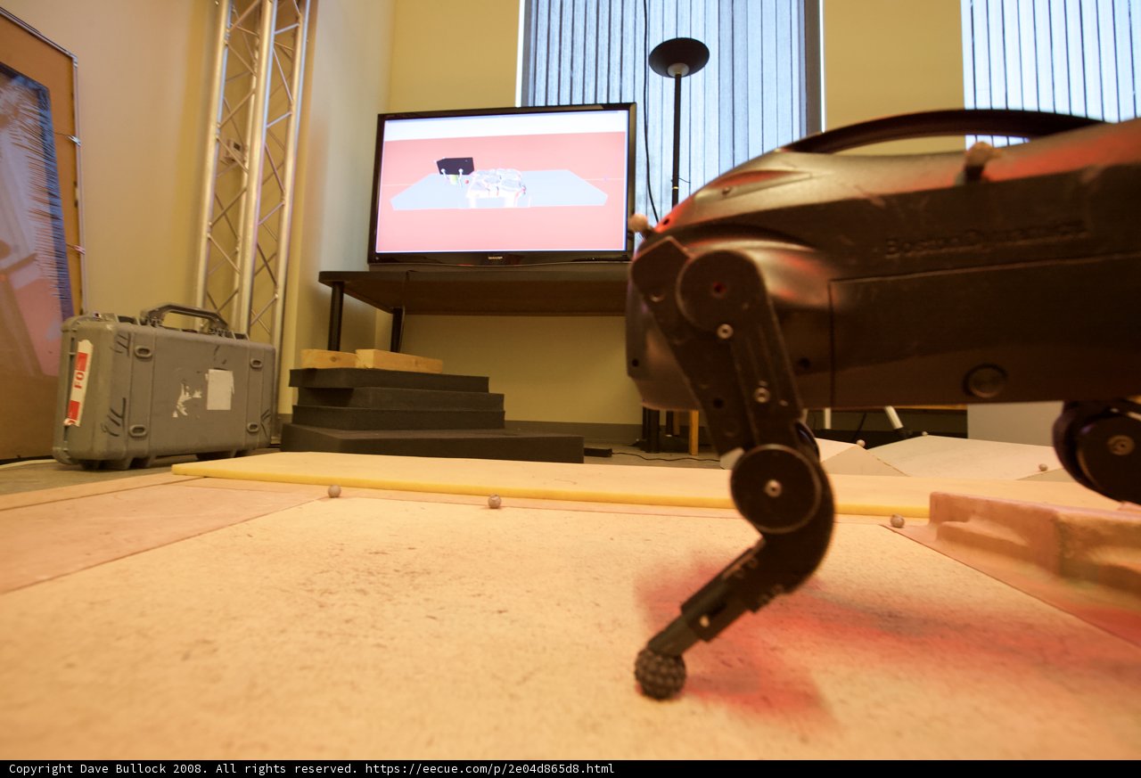Robot Watch TV on a Wooden Table