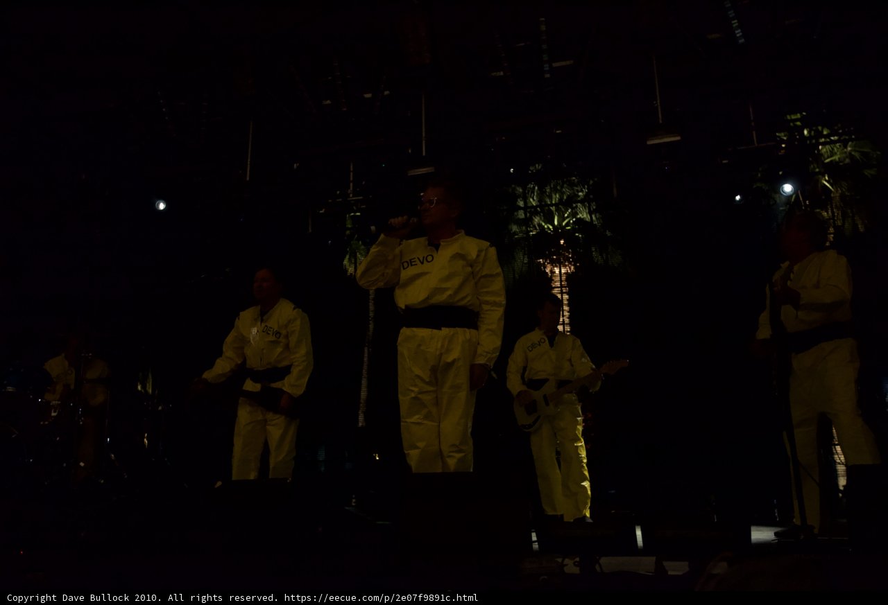 White Suits Rocking the Stage
