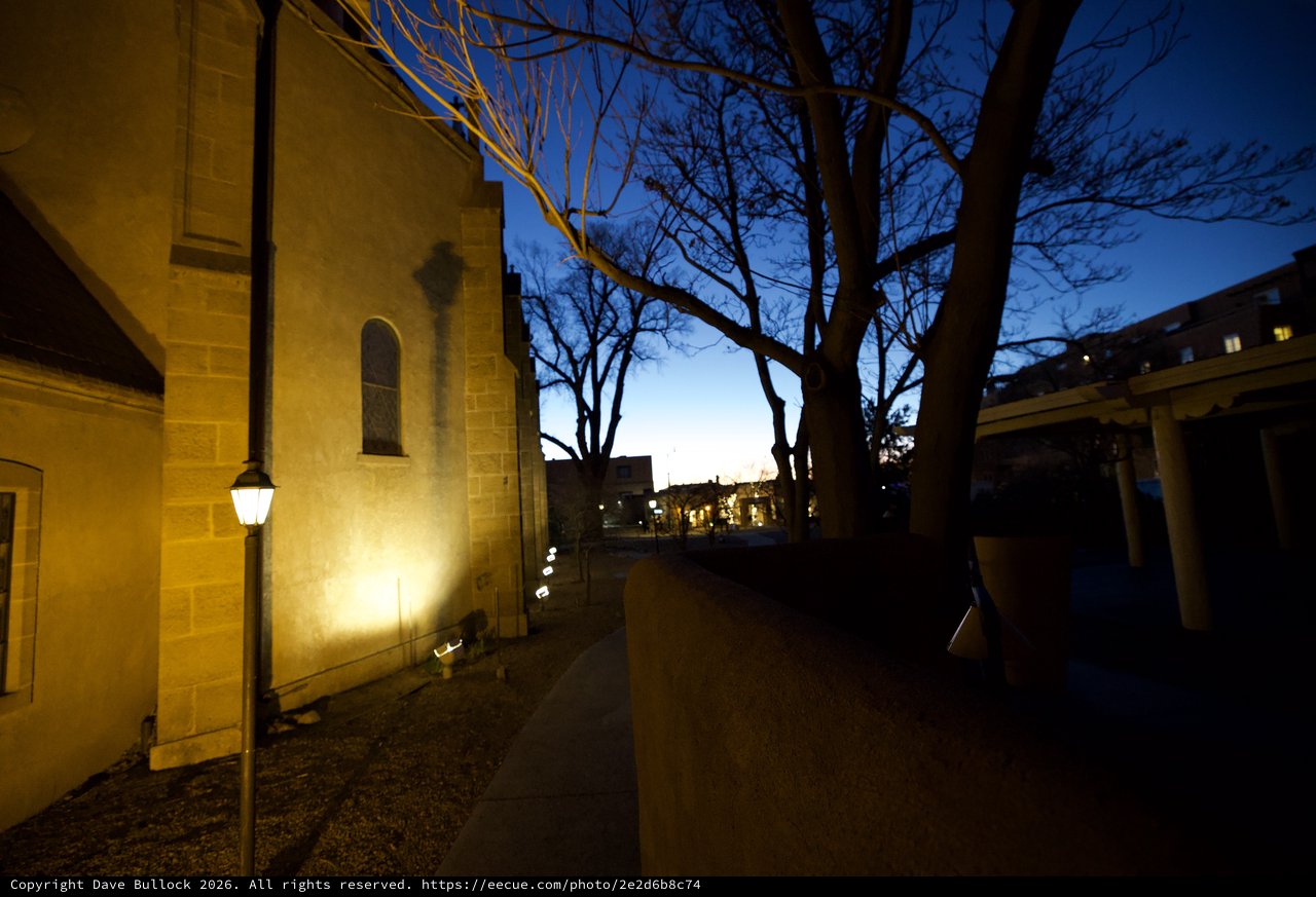 Church at Twilight with Bare Trees and Street Lamp