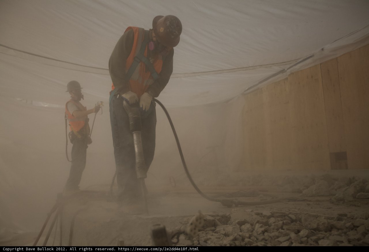 Construction Workers on Concrete Floor