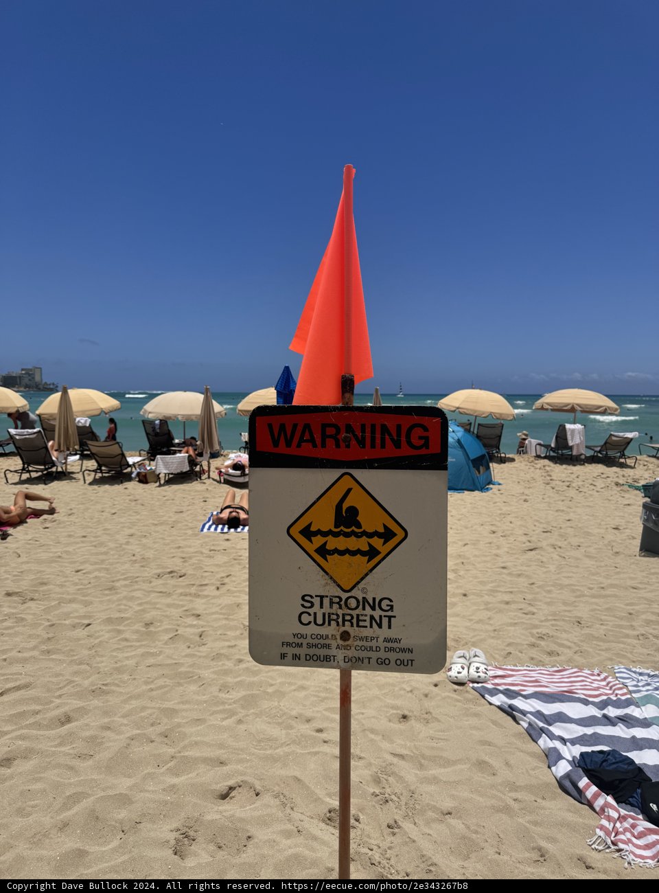 Heed the Warning: A Sunny, Yet Cautious Day at Waikiki Beach