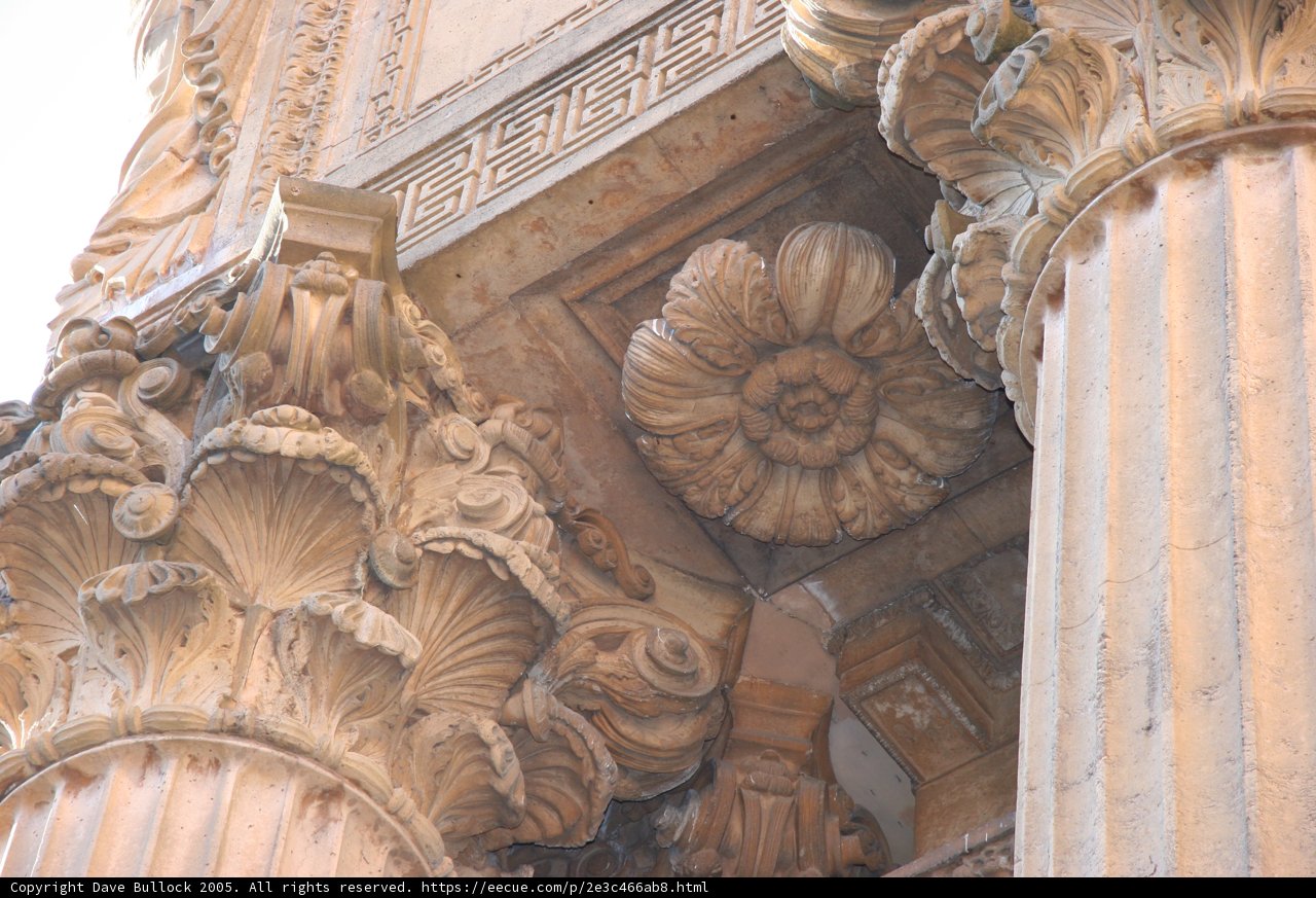 Ancient Religious Structure with Pillars and Flowers