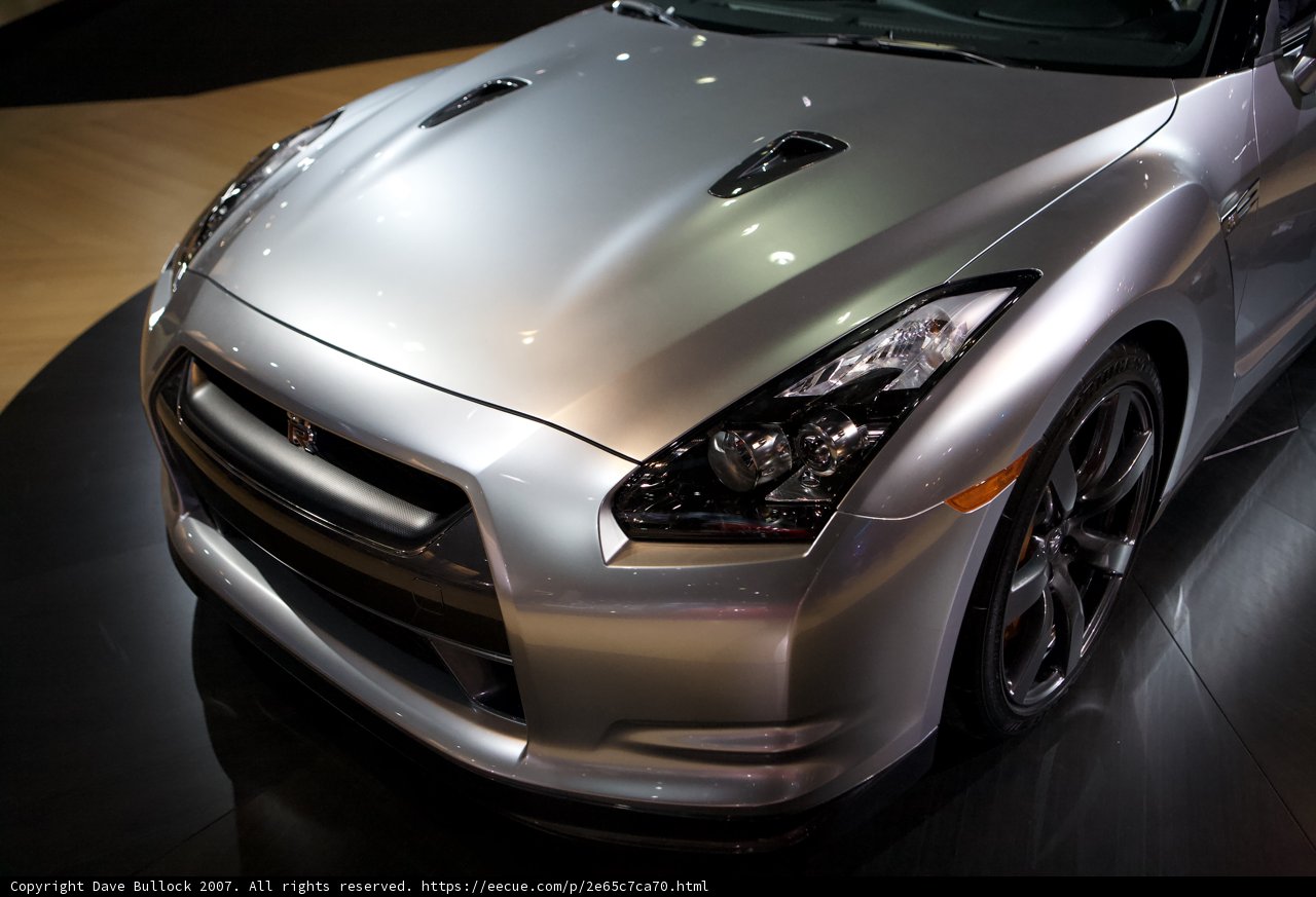 The Sleek Front-End of a Silver Nissan Sports Car