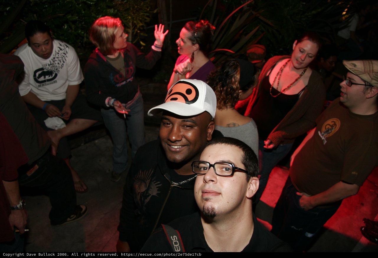 Friends Pose Together at Outdoor Night Party